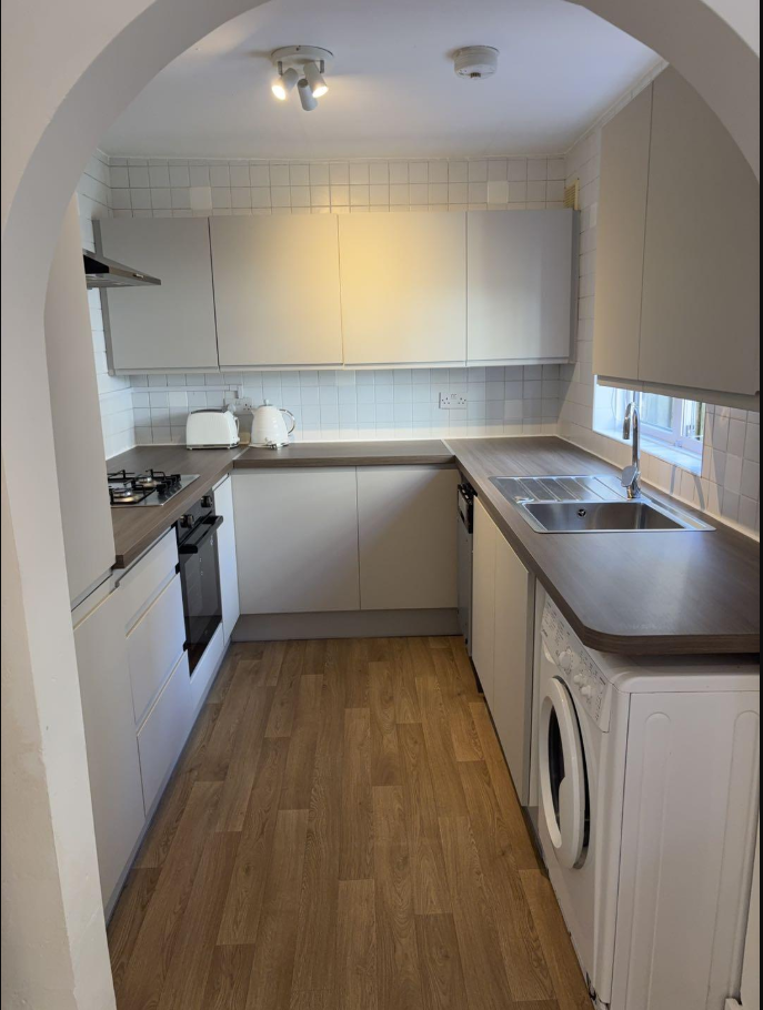 Completed kitchen with cleaned worktops and appliances